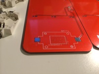 Adhesive on the battery holder footprint